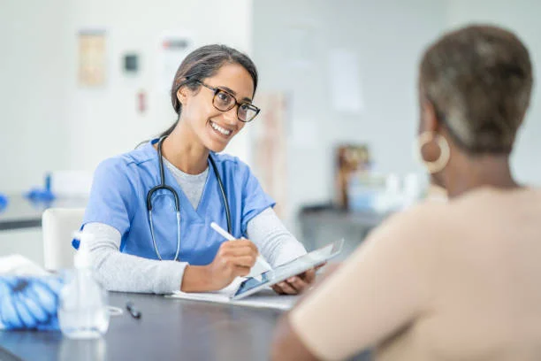 Nurse practitioner consulting with a patient, representing locum tenens NP jobs